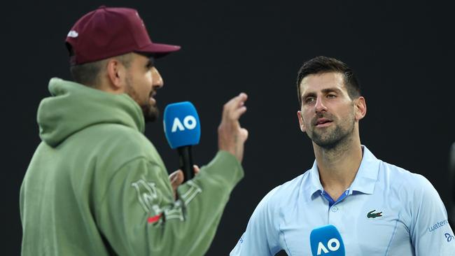 Novak Djokovic is interviewed by Nick Kyrgios after his quarter-finals singles match. Picture: Getty Images