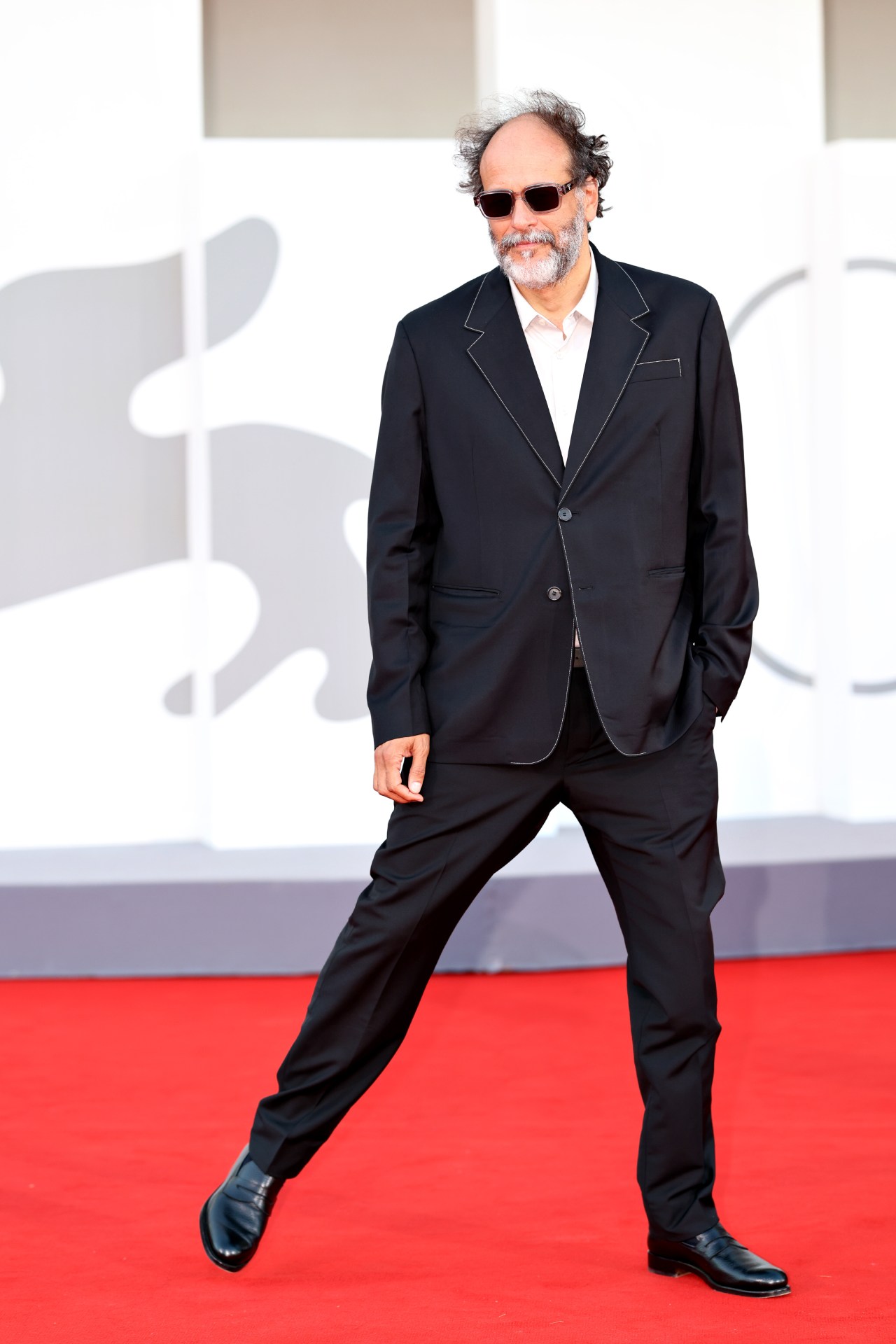 <p>Luca Guadagnino wears Prada</p>