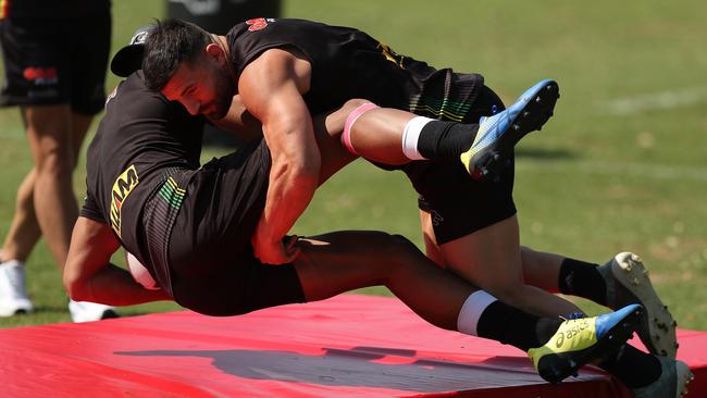 Winger Josh Mansour gets in some tackling practice. Picture: Brett Costello