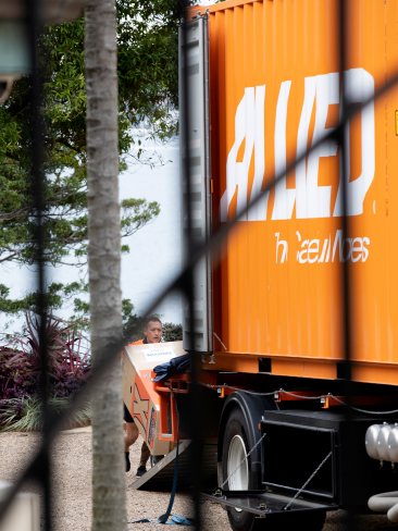 The Morrison family belongings were seen being loaded into two bright orange removalist trucks at Kirribilli House. Picture: NCA NewsWire / Nikki Short