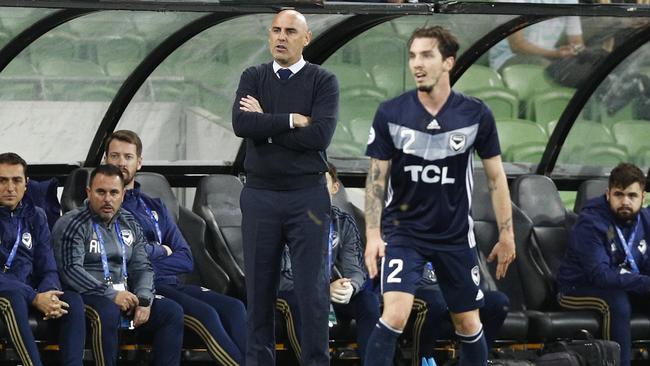 Kevin Muscat watches from the tactical area as his Melbourne Victory side take on Guangzhou Evergrande in the Asian Champions League earlier this week. Picture: AAP