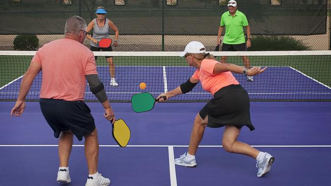 Pickleball in a mixed doubles format. The low impact game is popular with older players. Picture: iStock