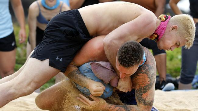 Matty Farrelly wrestling with Luke Toki in episode one of Survivor Australia. Picture: Channel 10