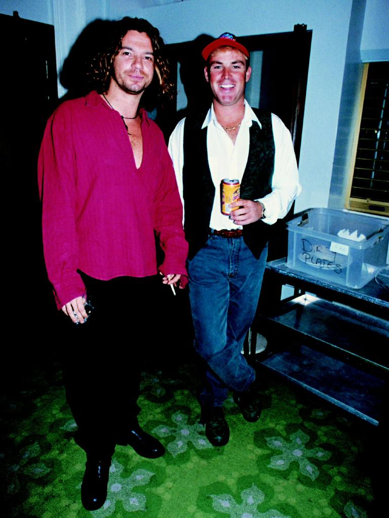 Warne with late INXS singer Michael Hutchence.