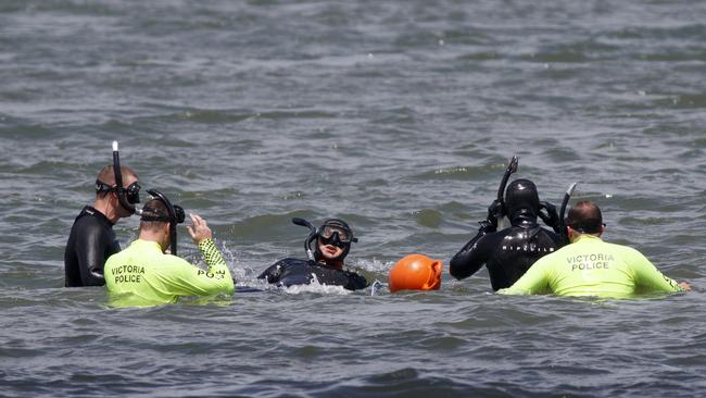 Police divers on the scene. Picture: David Geraghty