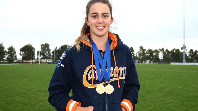 Chloe Molloy shows off her best and fairest and goalkicking awards. Picture: Jack Thomas.