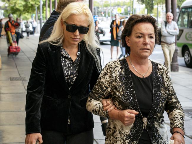 Romina Lekaj, (L) leaves court with an unidentified supporter Tuesday March 3, 2020. Picture: Mike Burton / AAP Photo.