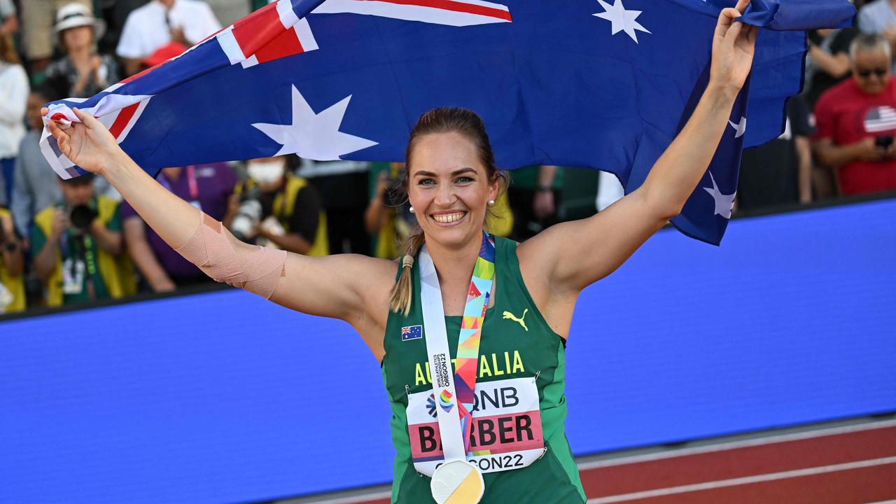 Australia's Kelsey-Lee Barber celebrates with her medal after winning the women's javelin throw final during the World Athletics Championships at Hayward Field in Eugene, Oregon on July 22, 2022. (Photo by ANDREJ ISAKOVIC / AFP)