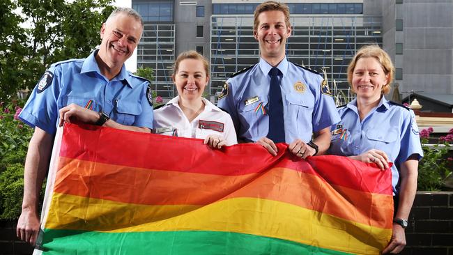 Preparing for the TasPride Festival march are, from left, Kym Manten from the Tasmania Fire Service, Amulance Tasmania’s Anna Ekdahl, Inspector Robert Blackwood from Tasmania Police, and Cheryl Ames from the Tasmanian State Emergency Service. Picture: NIKKI DAVIS-JONES