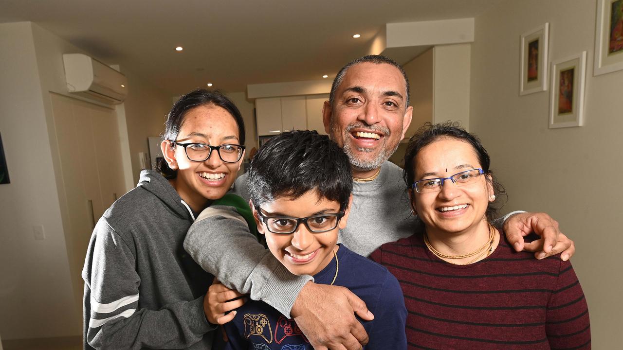 Darmesh Patel and his family Purvi, Swara and Manev are grateful to be back in Melbourne Picture: Rob Leeson.