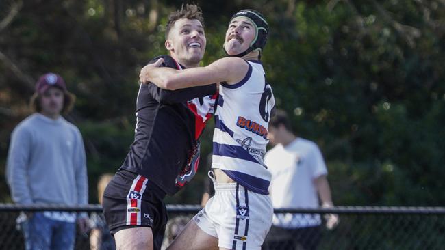 MPNFL: Devon Meadows’ Brandon White and Jack McGuiness of Pearcedale tussle. Picture: Valeriu Campan