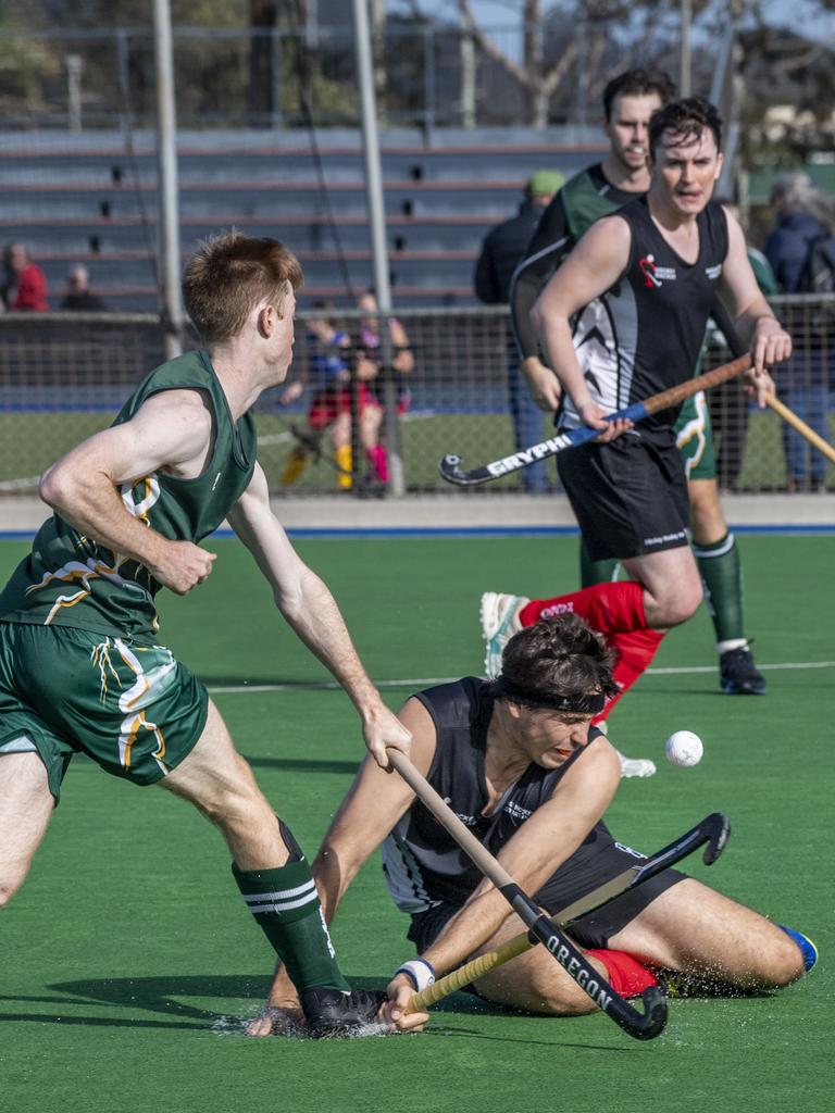 Trent Goldenstein, Ipswich and Jonathan Allcock, Mackay. Ipswich vs Mackay. Hockey Queensland Championship. Saturday, May 1, 2021. Picture: Nev Madsen.