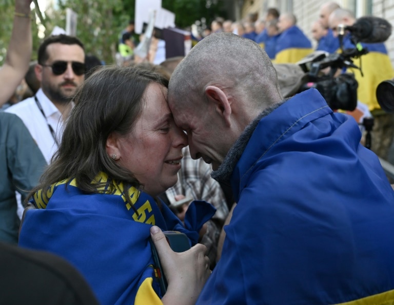 ‘Seventh heaven’: Tears and laughter as Ukrainian POWs return