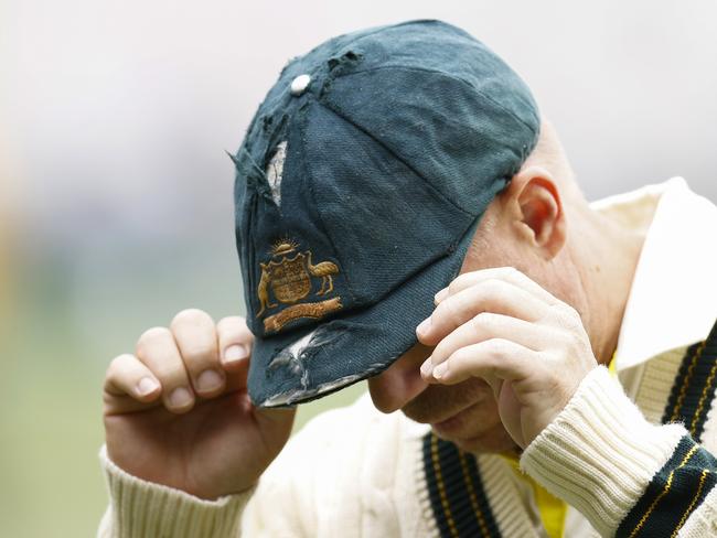 MELBOURNE, AUSTRALIA - DECEMBER 29: David Warner of Australia adjusts his baggy green cap at the conclusion of day four of the Second Test match in the series between Australia and South Africa at Melbourne Cricket Ground on December 29, 2022 in Melbourne, Australia. (Photo by Daniel Pockett/Getty Images)