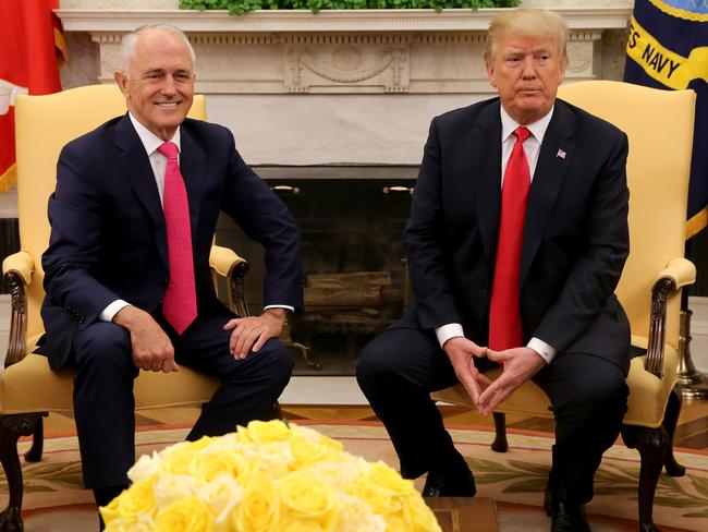 Prime Minister Malcolm Turnbull and President Donald Trump pose for pictures in the Oval Office. Picture: Nathan Edwards