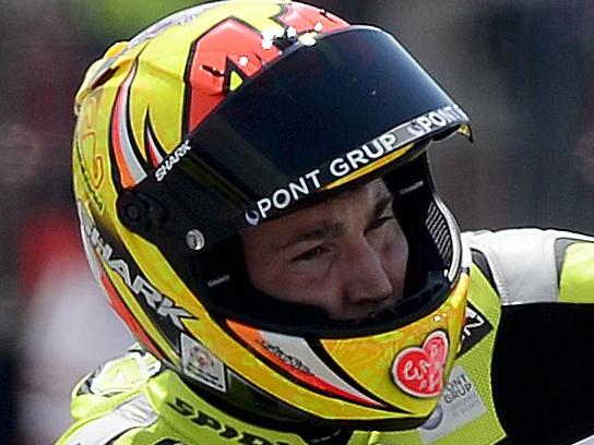 MGM Forward Racing's Spanish rider Aleix Espargaro waves after the Moto GP qualifying session of the Catalunya Grand Prix at the Montmelo racetrack near Barcelona on June 14, 2014. AFP PHOTO / JOSEP LAGO