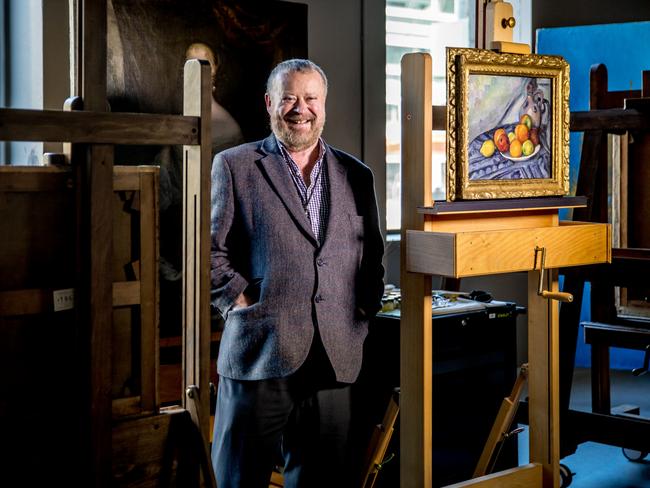 Ted Gott, senior curator of international art at the NGV, with Paul Cézanne ’s Fruit and a jug on a table. Picture: Tim Carrafa
