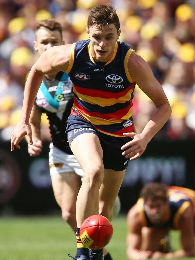 Jake Lever on the run at Adelaide Oval. Picture: Morne de Klerk (Getty Images)