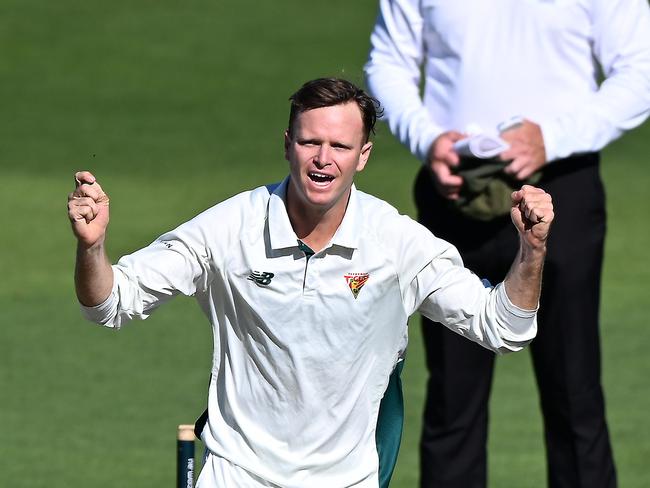 HOBART, AUSTRALIA - MARCH 18: Matt Kuhnemann of Tasmania celebrates the wicket of Josh Philippe of New South Walesduring the Sheffield Shield match between Tasmania and New South Wales at Blundstone Arena, on March 18, 2025, in Hobart, Australia. (Photo by Steve Bell/Getty Images)