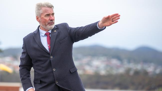 CEO of RSL Tasmania John Hardy at Hobart Cenotaph pointing out the lines of sight that will be interrupted by the planned Stadium. Picture: Linda Higginson.