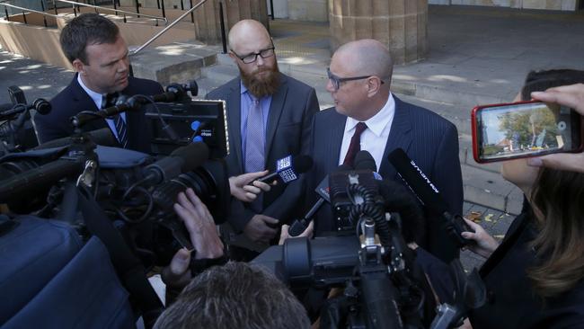 Warner’s lawyer, Michael Woods, addresses the media outside the Adelaide Magistrates Court. Picture: Simon Cross