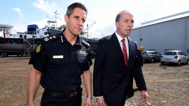 Peter Dutton and Roman Quaedvlieg arrive in 2015. Picture: AAP