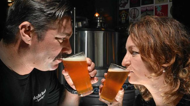 WNNERS: Moffat Beach Brewing owners Matt and Sharynne Wilson celebrate their success at the Independent Brewers Awards in Sydney. Picture: Patrick Woods