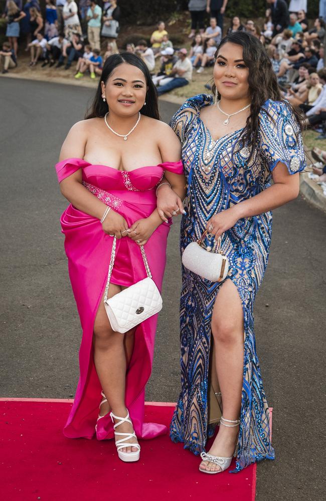 Cindy Aboy (left) and Kayla Griaga at Harristown State High School formal at Highfields Cultural Centre, Friday, November 17, 2023. Picture: Kevin Farmer