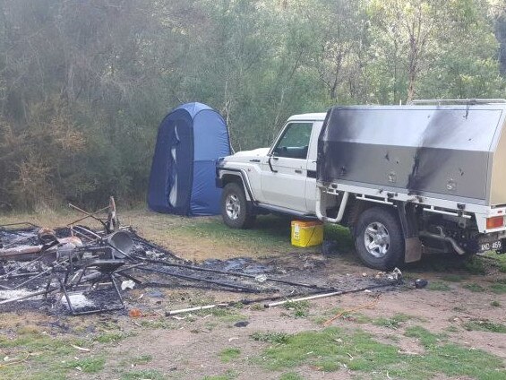 Russell Hill and Carol Clay's burnout campsite photographed by a camper near Dry River track at Billabong in the Wonnangatta Valley. Pic credit: ABC