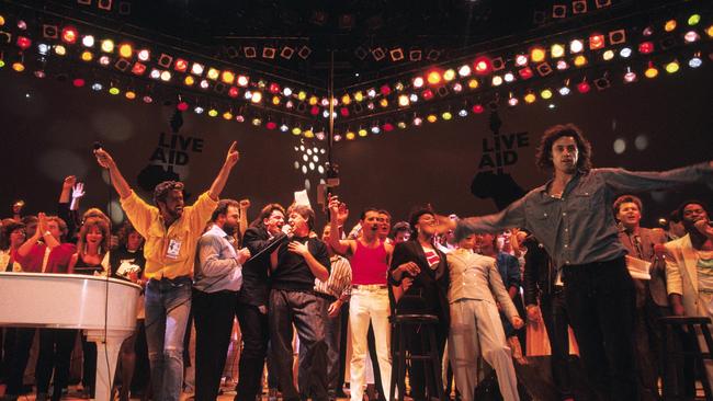 The historic Live Aid concerts turn 40 next year. George Michael, Bono, Paul McCartney, Freddie Mercury and Bob Geldof perform at Wembley Stadium on July 13, 1985. Picture: Georges De Keerle/Getty Images.