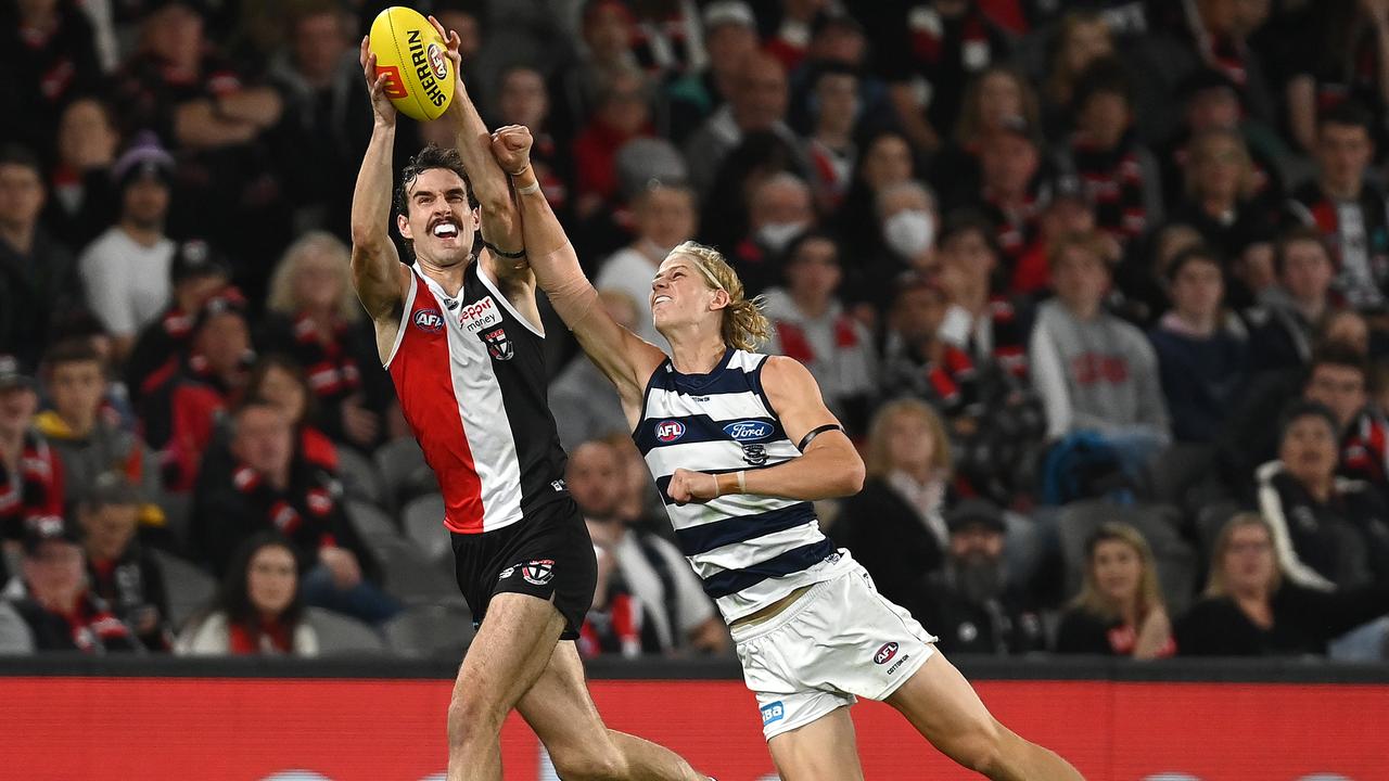 MELBOURNE, AUSTRALIA - MAY 14: Max King of the Saints marks infront of Sam De Koning of the Cats during the round nine AFL match between the St Kilda Saints and the Geelong Cats at Marvel Stadium on May 14, 2022 in Melbourne, Australia. (Photo by Quinn Rooney/Getty Images)