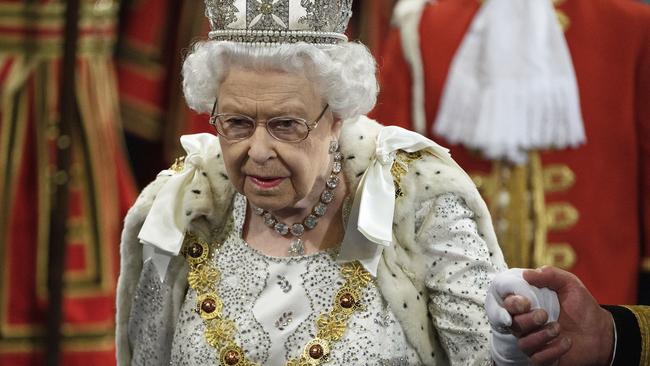 Queen Elizabeth proceeds through the Royal Gallery before delivering the Queen's Speech last week. Picture; AP.