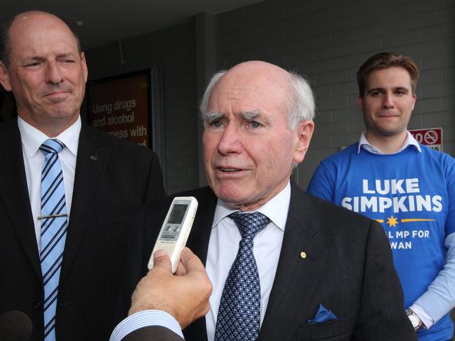 Ex-prime minister John Howard promotes the Liberal campaign in Warwick Grove shopping centre in the electorate of Cowan, WA.