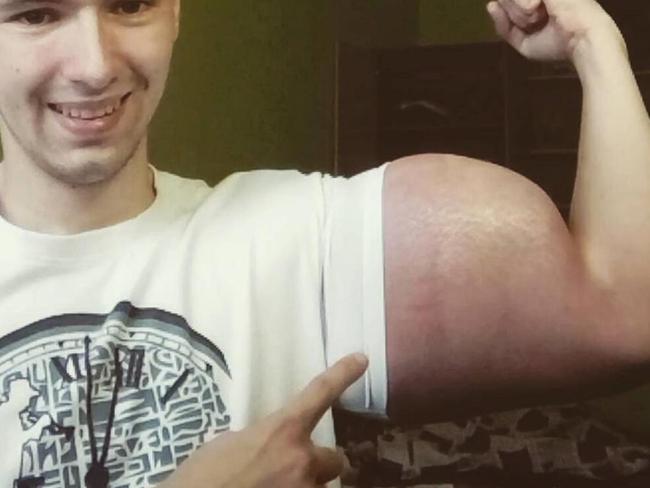 ONE TIME WEB USE ONLY - FEE APPLIES FOR REUSE - Kirill Tereshin, 21, shows off his 'popeye like' muscles. Picture: CEN/Australscope