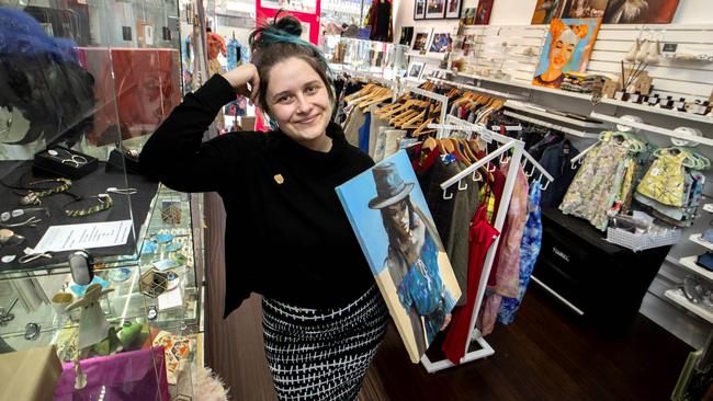 Elle-May Michael, owner of In.cube8r Gallery &amp; Emporium in Prahran, Melbourne says it’s all hands on deck as she prepares for Wednesday’s reopening. Picture: David Geraghty