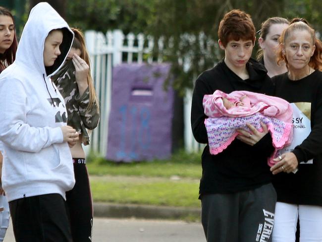 Jenifer Morrison (in the white jumper), her boyfriend, Jayden Lavender and their daughter were found in Willmot today. Jayden’s mother Tracy Lavender is with them. Picture: Justin Sanson