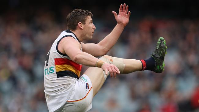 Josh Jenkins kicks for goal for the Crows during the Round 19 AFL match against Carlton. Picture: AAP Image/David Crosling