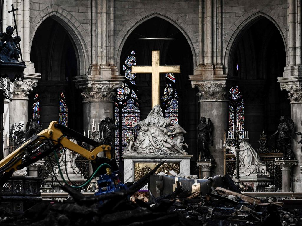 Notre Dame fire: Louis Vuitton and Gucci owners donate £260m to rebuild  cathedral, World, News