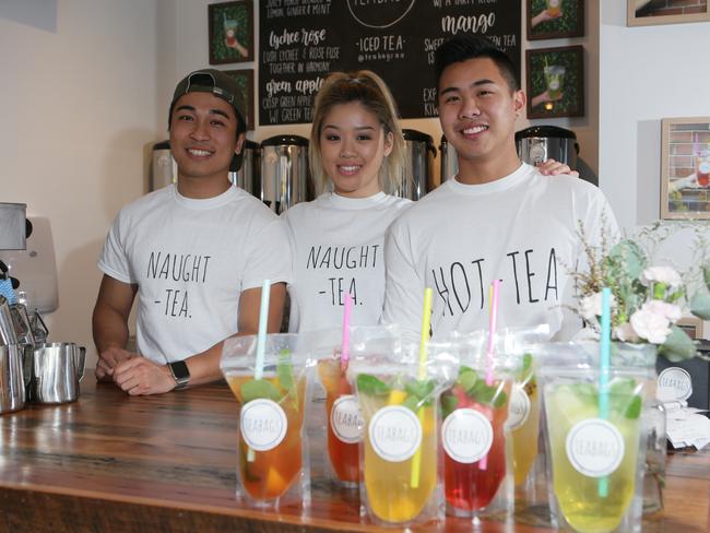 Manager Tuan Tran with staff members Nhi Ho and Johnny Dang.