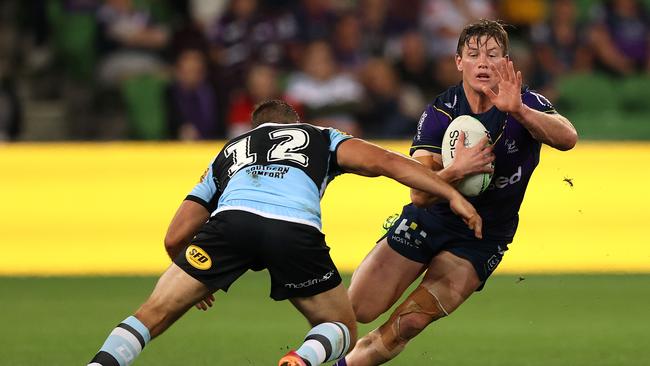 MELBOURNE, AUSTRALIA - APRIL 30: Harry Grant of the Storm runs the ball during the round eight NRL match between the Melbourne Storm and the Cronulla Sharks at AAMI Park on April 30, 2021, in Melbourne, Australia. (Photo by Robert Cianflone/Getty Images)