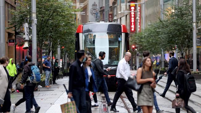 Pedestrians have returned to rejuvenate Sydney’s CBD after two long years. Picture: Damian Shaw