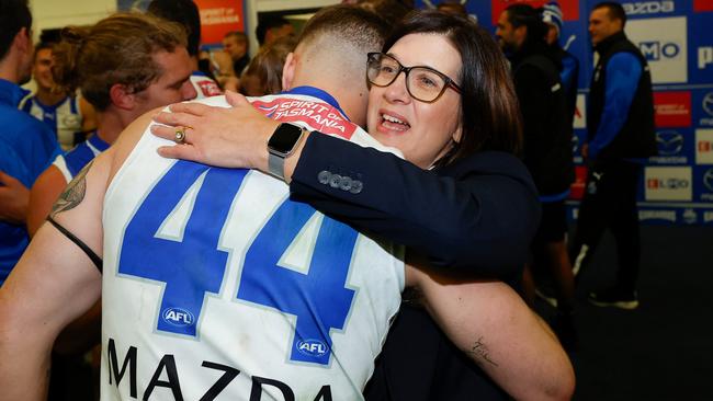 Match-winner Cameron Zurhaar and president Sonja Hood revel in the Kangaroos’ second win of the season. Picture: Getty Images