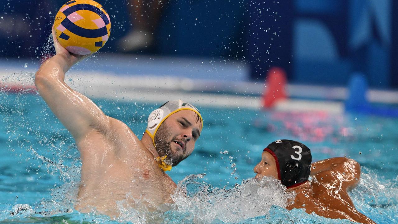 Australia's #08 Jacob Mercep shoots the ball at the Paris La Defense Arena in Paris on August 5, but underdogs Japan came away with the win. Picture: Andreas Solaro/AFP