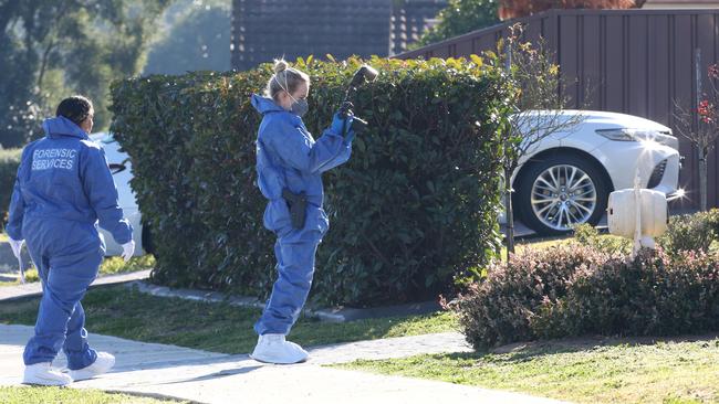 Forensic analysts at the scene of Rita Camilleri’s alleged murder. Picture: David Swift.