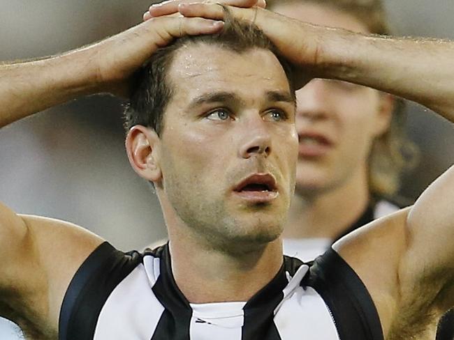 AFL: Round 4 Collingwood v Melbourne at the MCG. A dissappointed Collingwood team trudge of the MCG. . Pic: Michael Klein