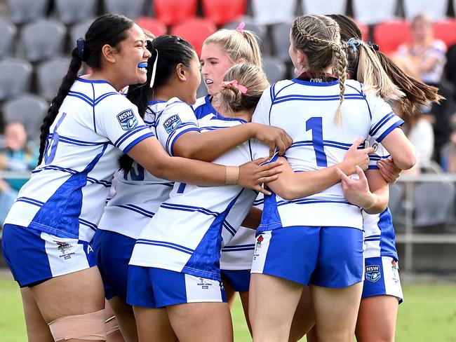 NSWCCC players celebrate a try Girls NSWCCC Vs Victoria in the ASSRL national championships in Redcliffe. Saturday July 1, 2023. Picture, John Gass