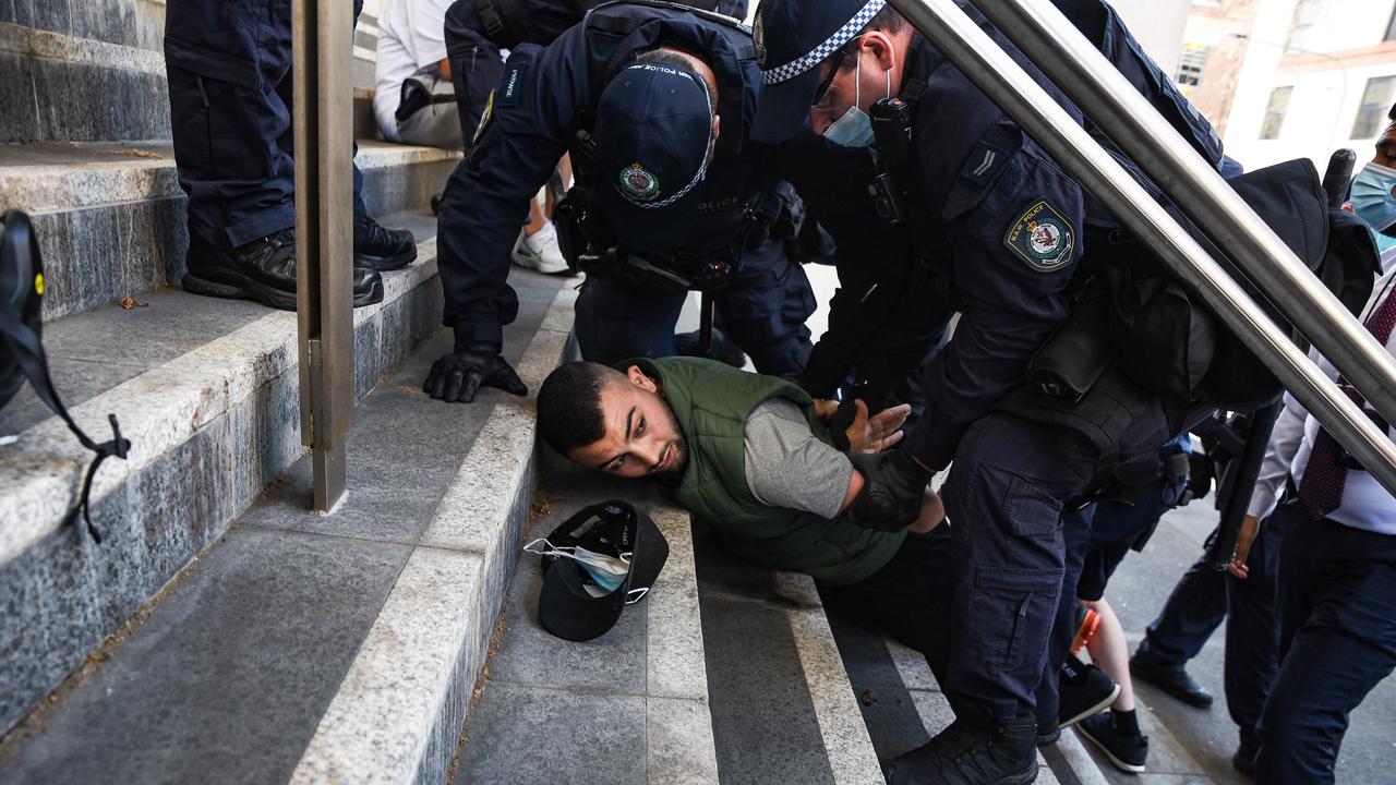 Police detain protesters near Victoria Park. Picture: NCA NewsWire / Flavio Brancaleone