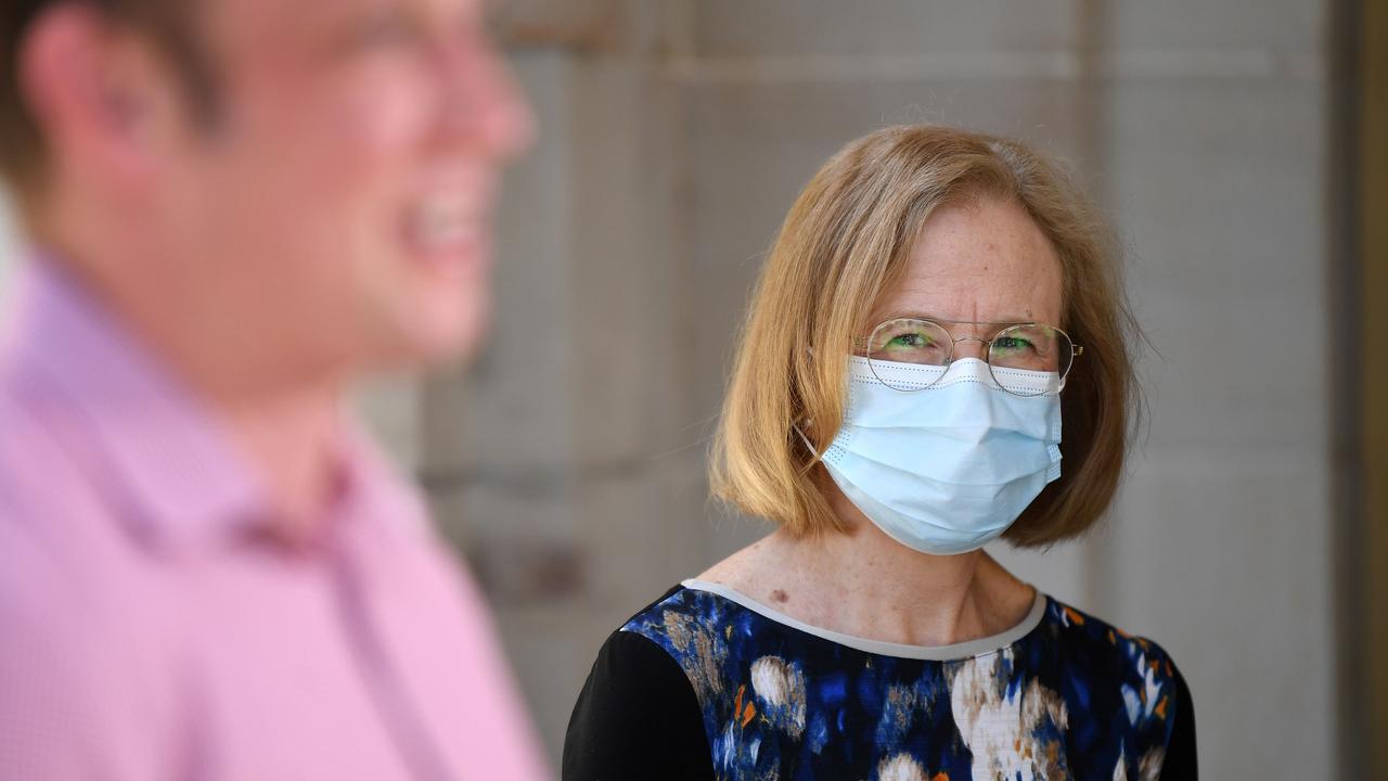 Queensland Chief Health Officer Dr Jeannette Young watches Deputy Premier Steven Miles during a press conference to provide a covid update. Picture: NCA NewsWire / Dan Peled