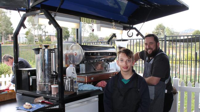 Kai is one of five students from Year 7 to 10 who help run the cafe with the Salvation Army’s Liam Holland.