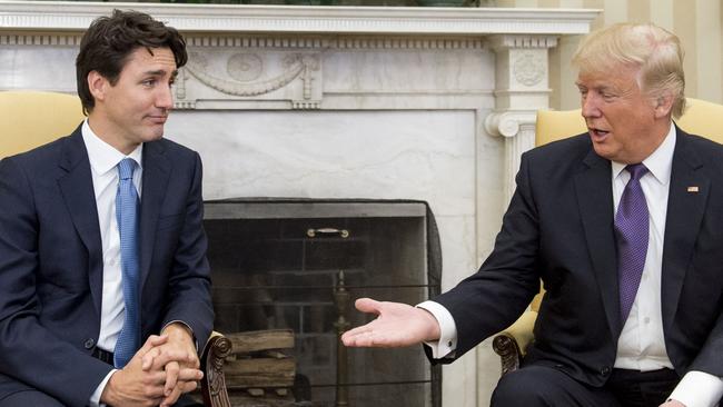 US President Donald Trump and Canadian PM Justin Trudeau meet in the Oval Office of the White House in Washington in February. Picture: AFP